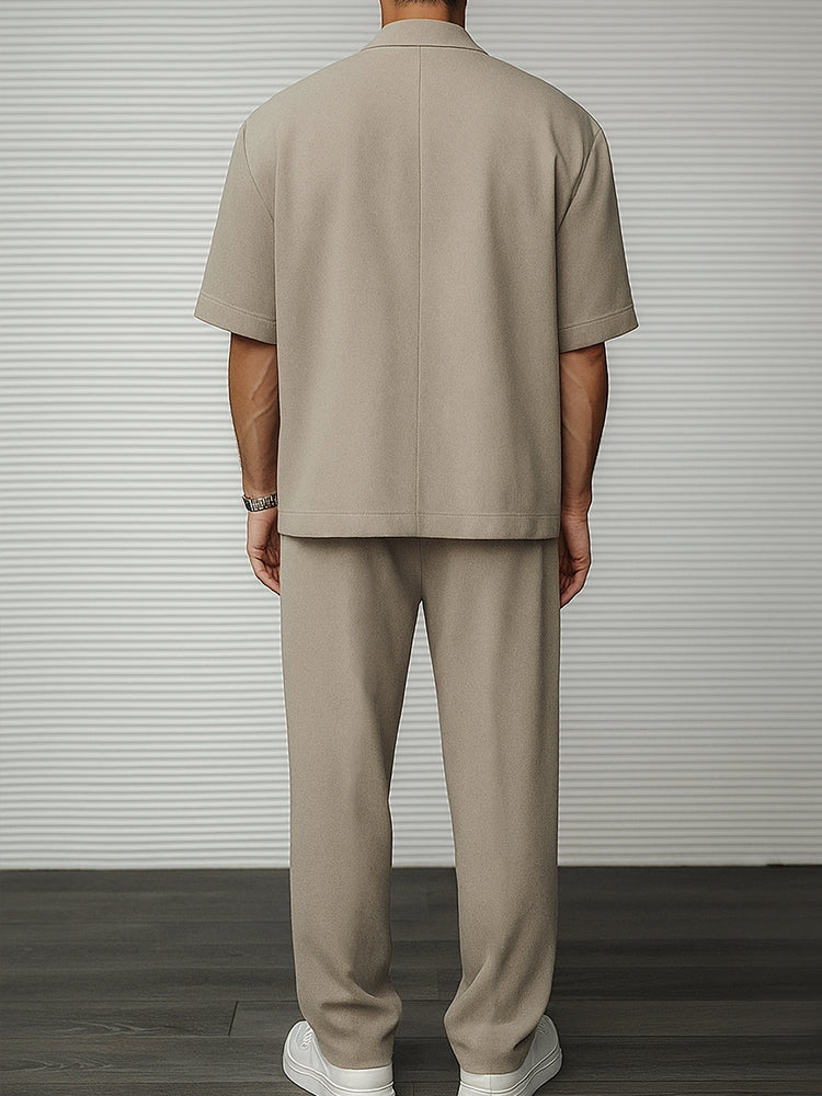 Khaki short-sleeve blazer and matching trousers, rear view full length