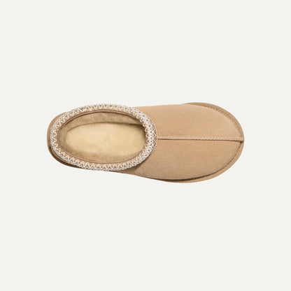 Mocha tan suede slipper with plush insole and patterned collar edge trim