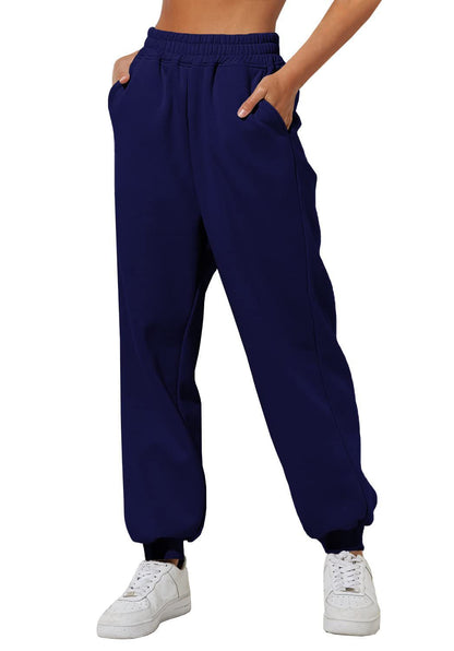 Navy sweatpants with elastic waistband, drawstring, and cuffed ankle hems.