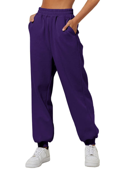Dark purple sweatpants with elastic waistband, drawstring, and cuffed ankle hems.