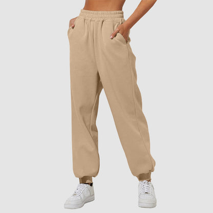 Light beige casual sweatpants joggers with elastic waistband and tapered cuff hem