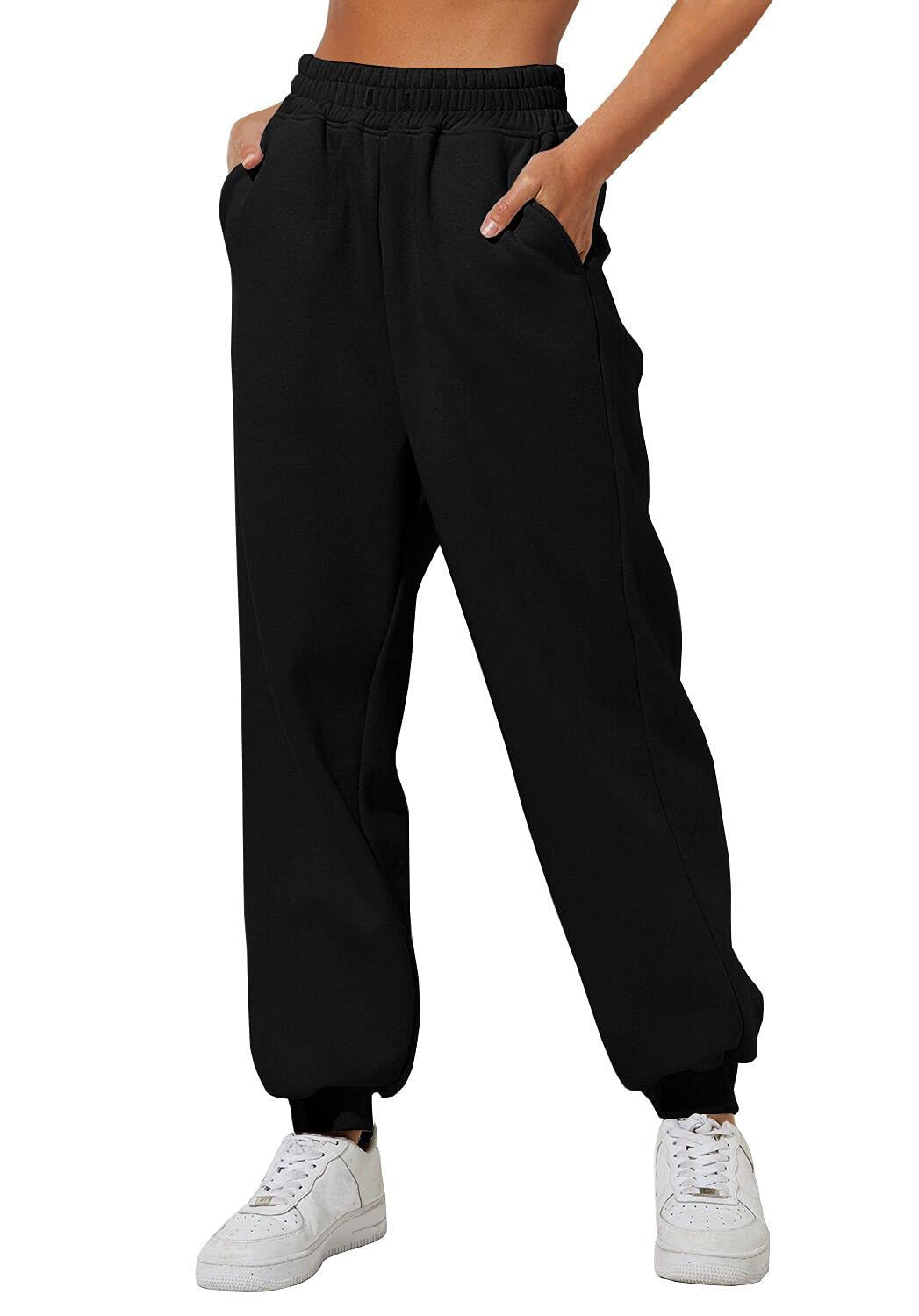 Black sweatpants joggers with elastic waistband and cuffed ankle hem.