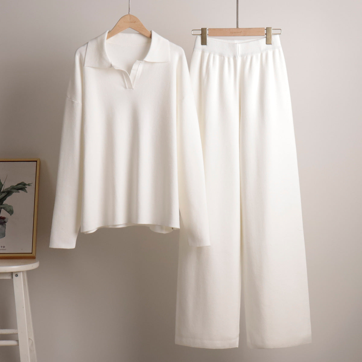Women’s knit polo set with wide-leg trousers, white hanging set