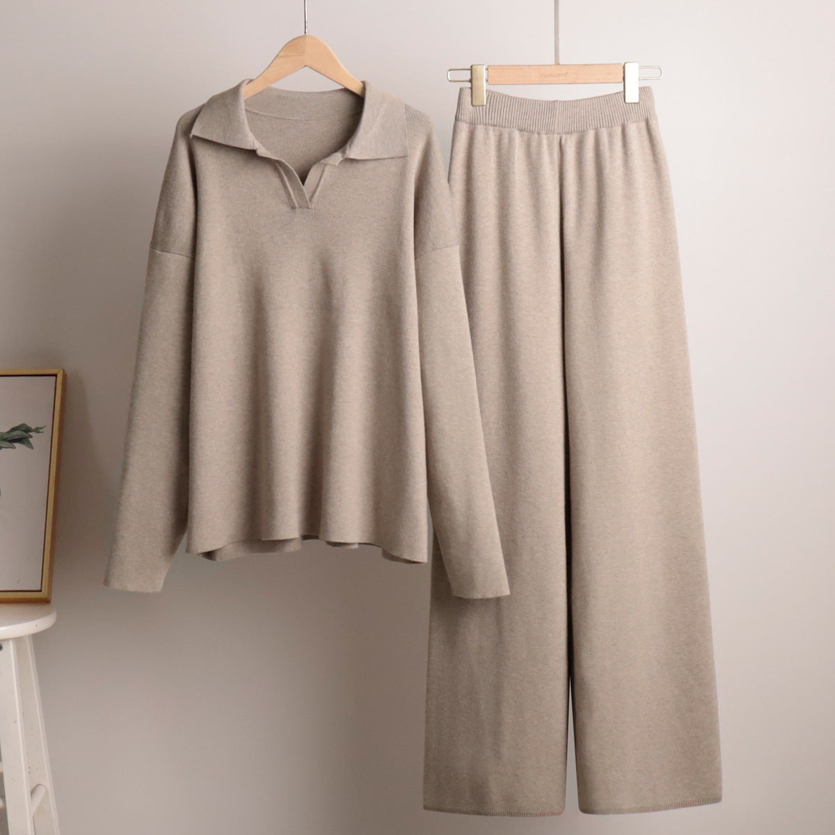 Women’s knit polo set with wide-leg trousers, light beige hanging set