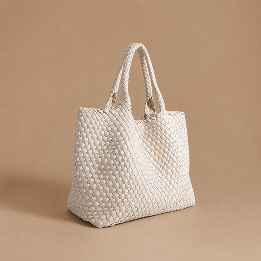 Womens woven tote bag with top handles, off-white woven texture.
