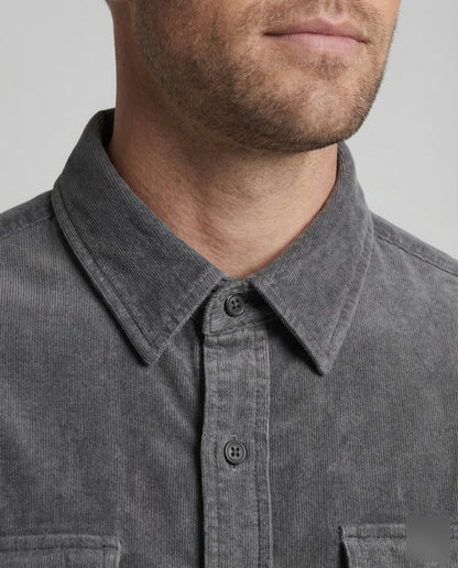 Grey corduroy utility shirt close-up: buttoned collar and front placket with two buttons