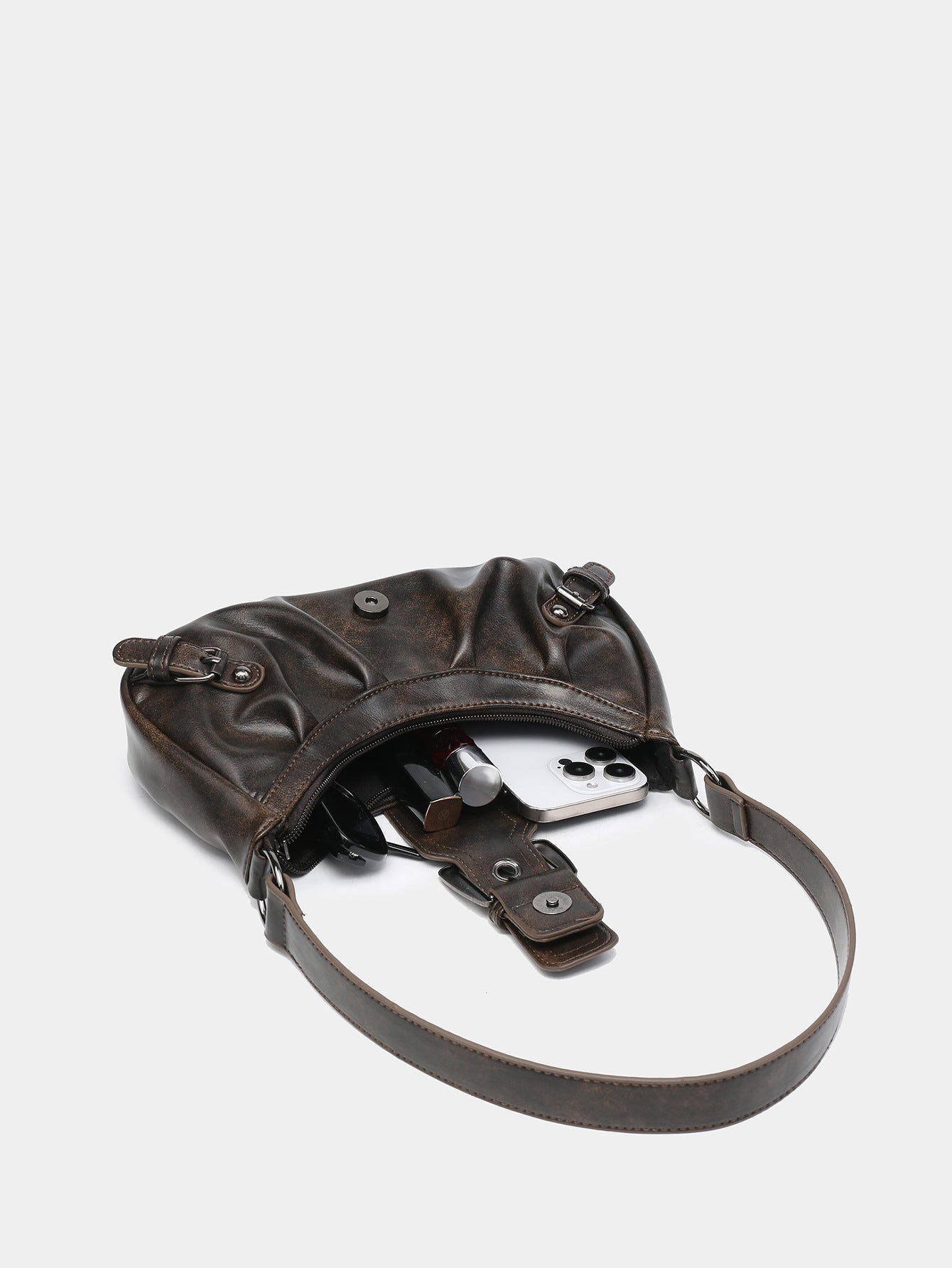Brown faux leather hobo bag with crossbody strap; open top shows phone holder detail
