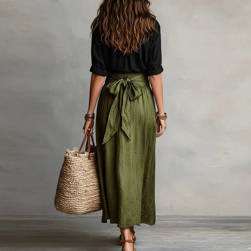 Linen co ord set: black wrap blouse with olive drawstring midi skirt, back view