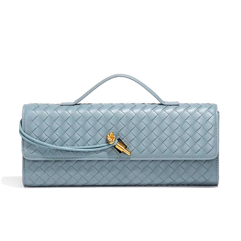 Light blue woven vegan leather clutch with gold turn-lock and top handle, fold-over flap