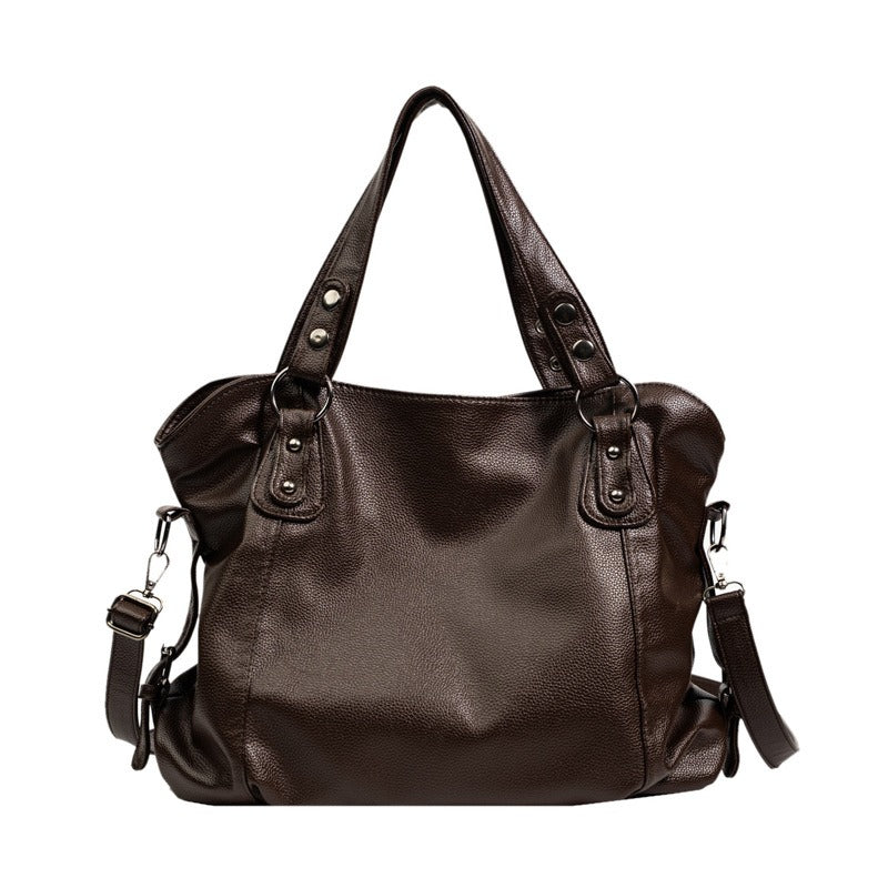 Vegan leather handbag in dark brown with two top handles and side zipper pockets