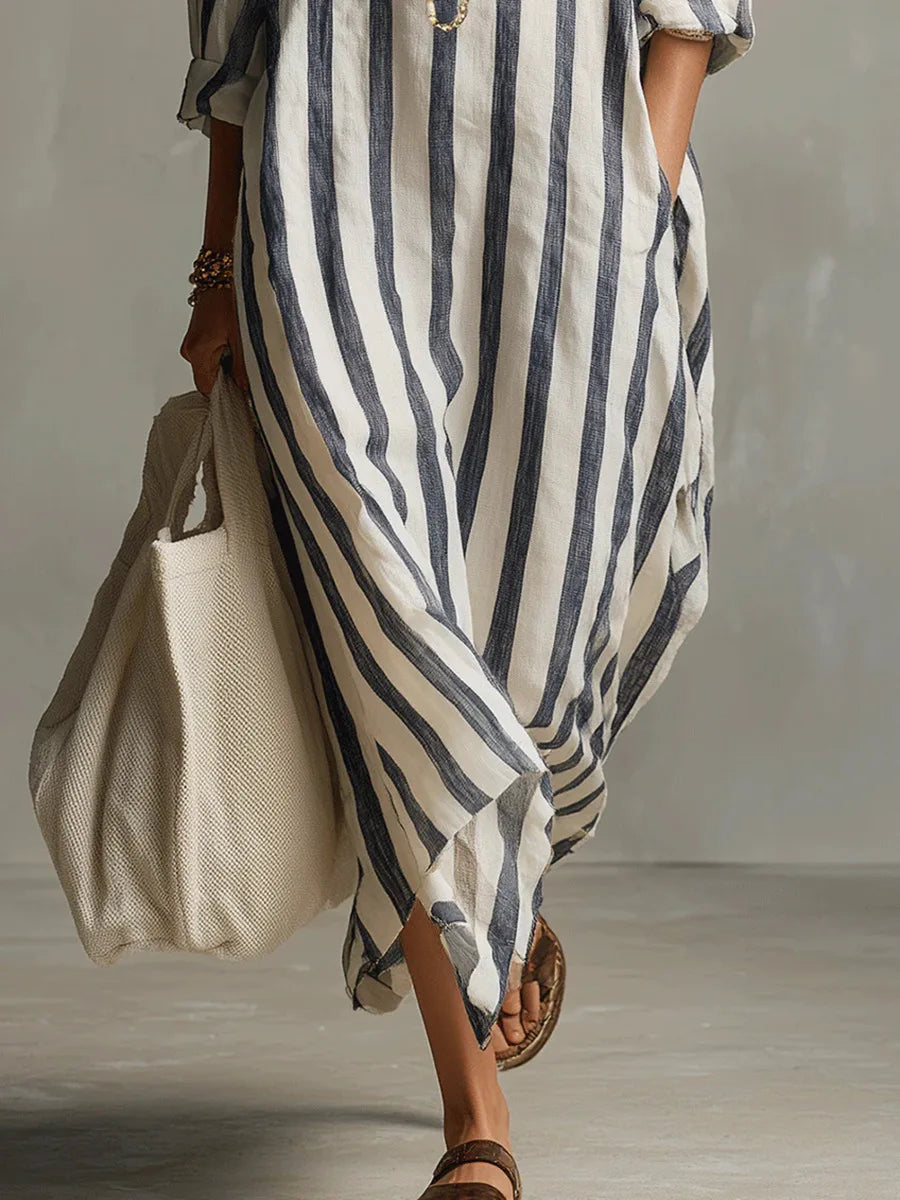 Striped linen shirt dress in blue and white vertical stripes, rolled sleeves, button front