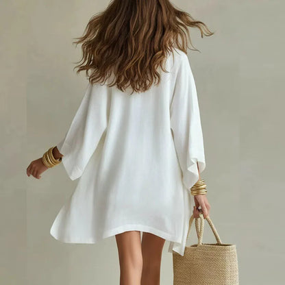 White linen three-piece set, back view: flared kimono, tunic top, drawstring shorts