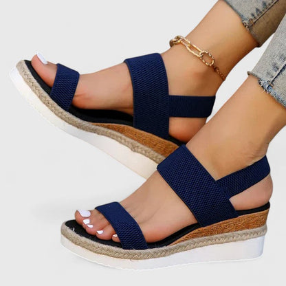 Blue comfort sandals with wide straps and espadrille wedge sole, gold chain ankle
