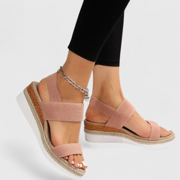 Peach comfort sandals with wide straps, espadrille wedge sole, gold chain ankle strap