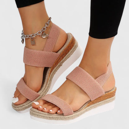 Pink comfort sandals with wide straps, espadrille wedge sole, gold chain ankle bracelet