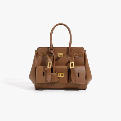 Brown structured handbag with top handles and gold-tone hardware, front view