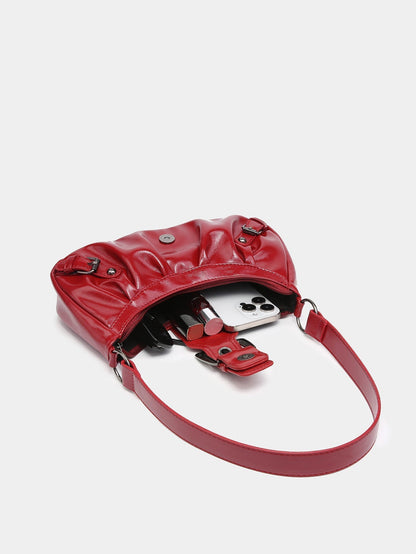Red faux leather hobo bag with crossbody strap; interior shows a phone and card pouch