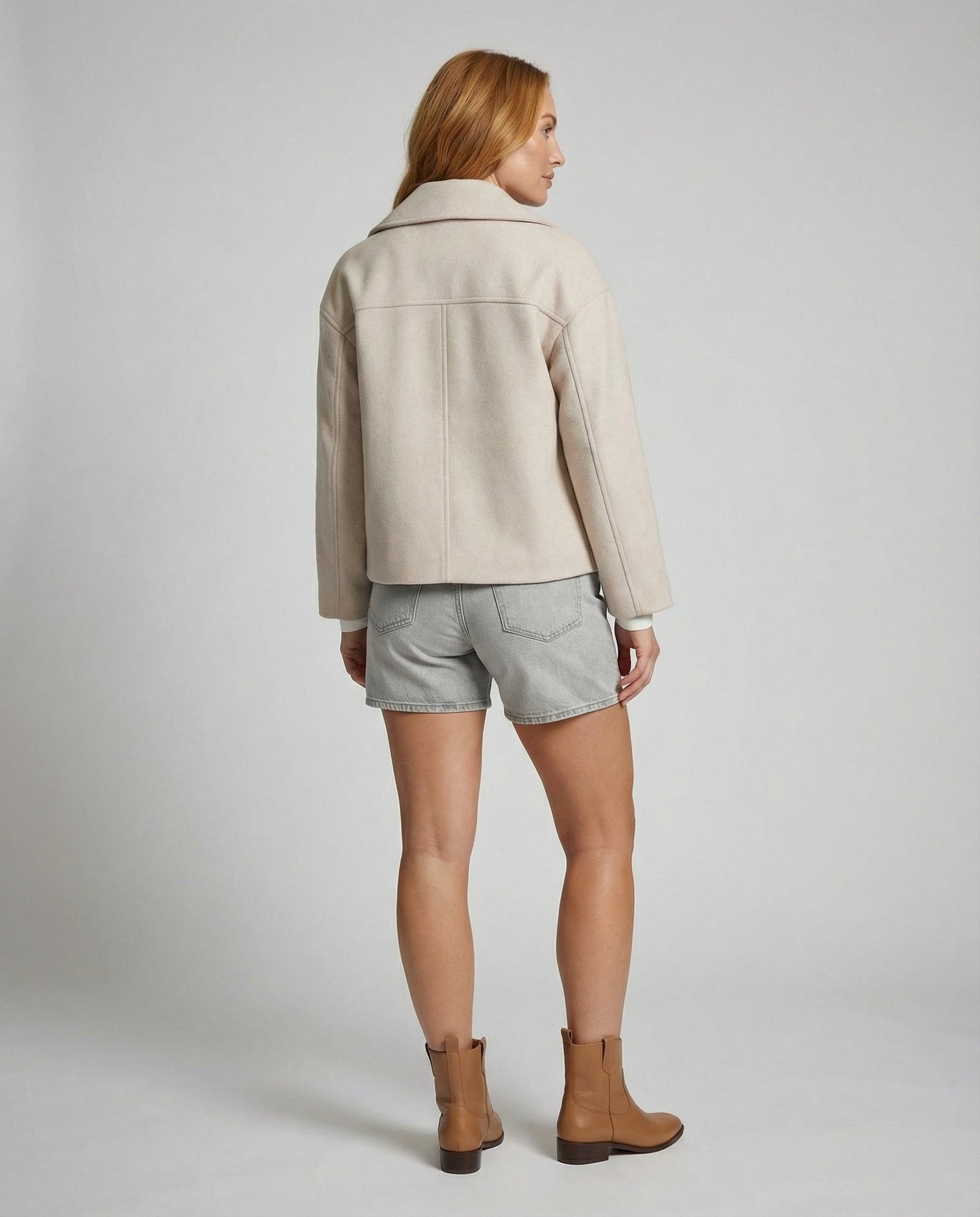 Cropped double-breasted jacket back view in light beige with yoke seam