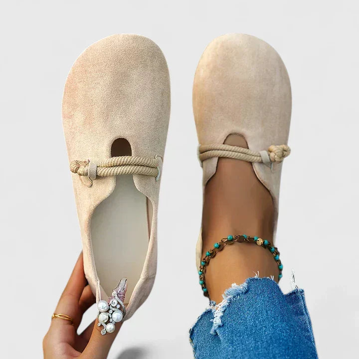 Beige slip-on walking shoes with knotted elastic strap and rounded open toe