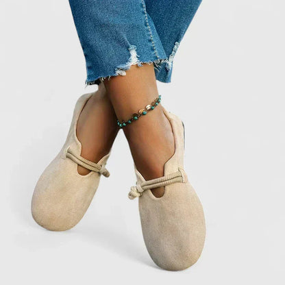 Beige slip-on walking shoes with elastic ankle strap and soft suede-like finish
