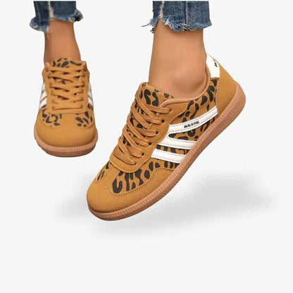 Tan leopard-print comfort trainers with white side stripes, lace-up and gum sole