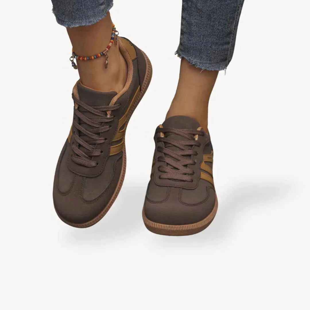 Brown comfort trainers with dark laces, lace-up panels and textured rubber sole