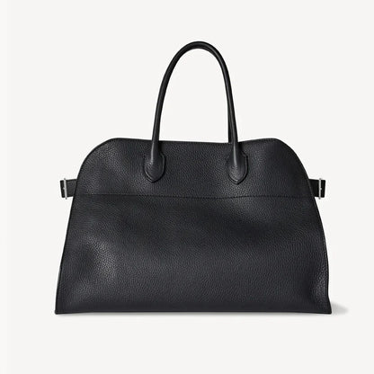 Black pebbled leather tote handbag with two top handles and side buckle straps