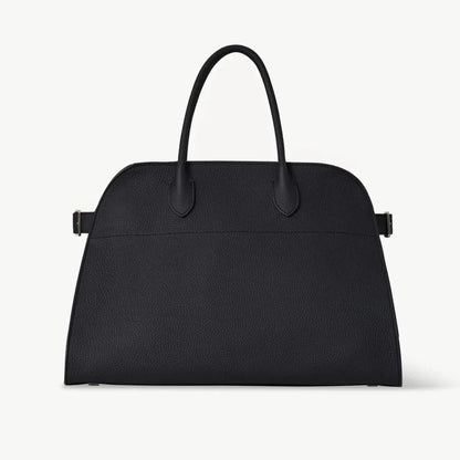 Black pebbled leather tote handbag with two top handles and side buckle straps