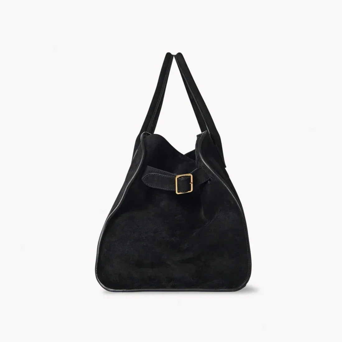 Black suede shoulder tote with open top, two straps, and square gold buckle patch