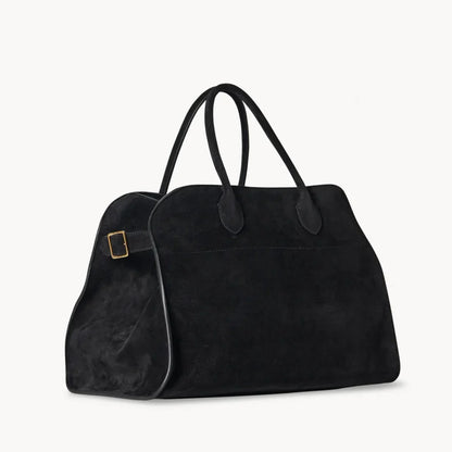 Black suede tote handbag with two top handles and small front pouch
