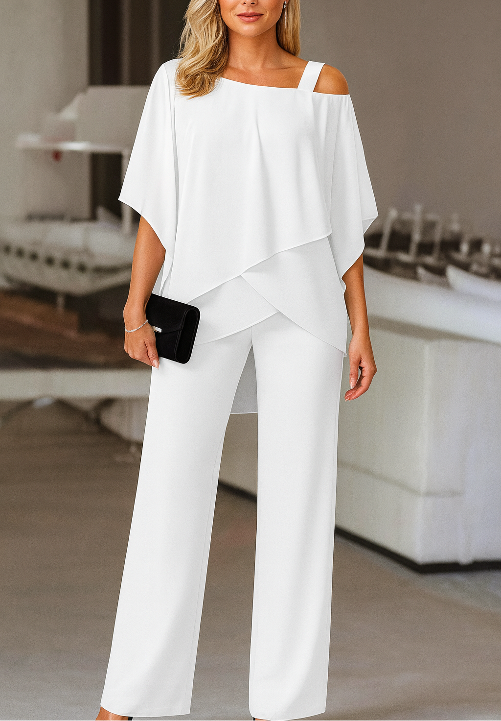 Women’s evening pants set in white: layered cold-shoulder blouse and wide-leg trousers