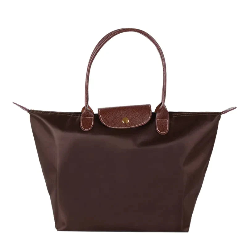 Coffee-brown structured shoulder tote with brown leather handles and front flap snap