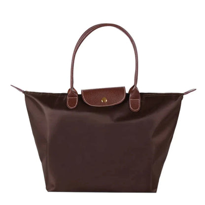 Coffee-brown structured shoulder tote with brown leather handles and front flap snap