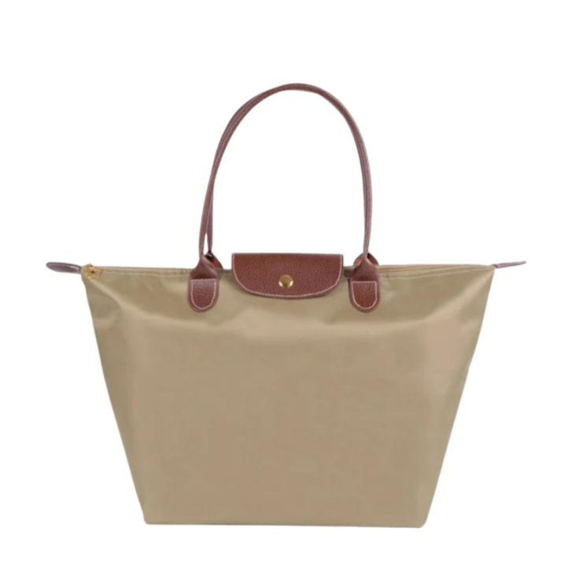 Beige structured shoulder tote with brown leather handles and front flap snap