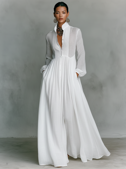 White cotton-linen maxi shirt dress with V-neck, long sleeves, and gathered empire waist
