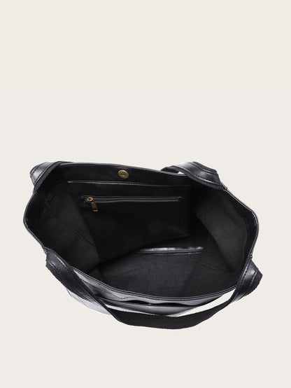 Black leather tote bag with open top and interior lining