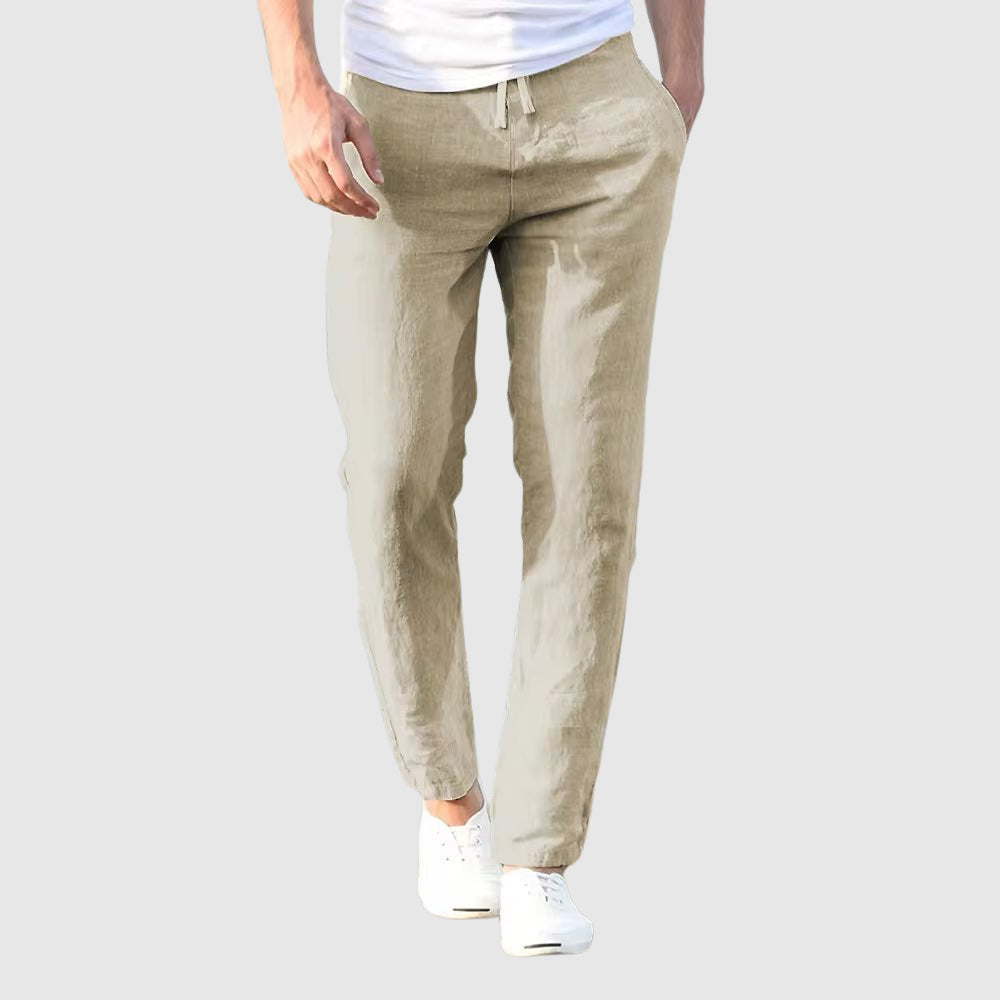 Beige lightweight linen pants with drawstring waist and slim tapered fit