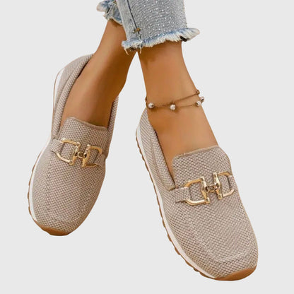 Beige orthopedic mesh loafers with gold buckle bit and light outsole