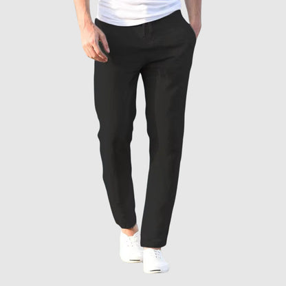 Black lightweight linen pants with drawstring waist and tapered ankle-length legs