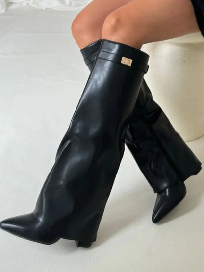 Black leather mid-calf boots with metallic buckle and block heel, side view
