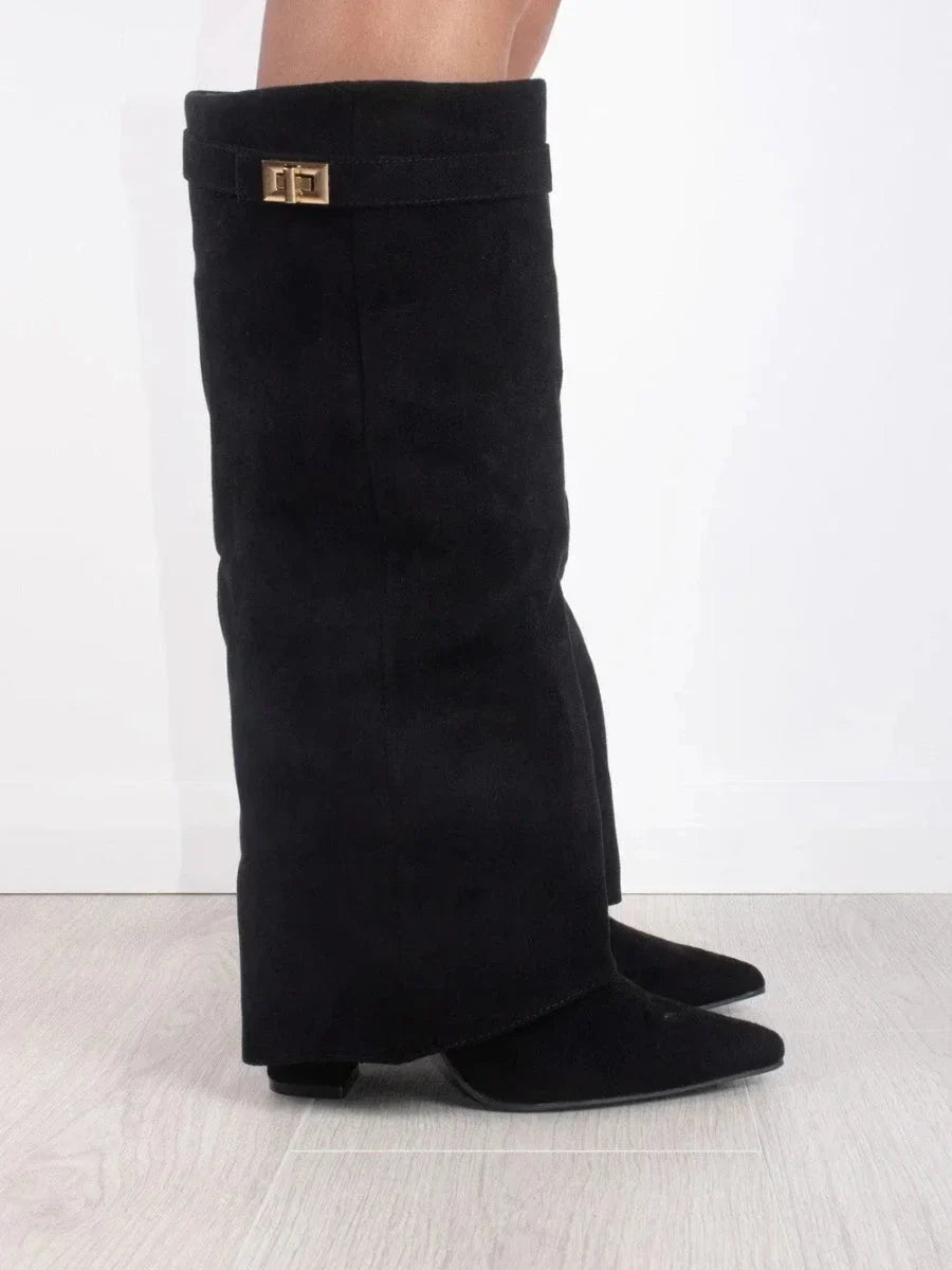 Black suede heeled mid-calf boots with square metallic buckle on cuff