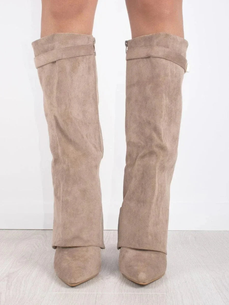 Pair of beige suede heeled knee-high boots with cuff buckle