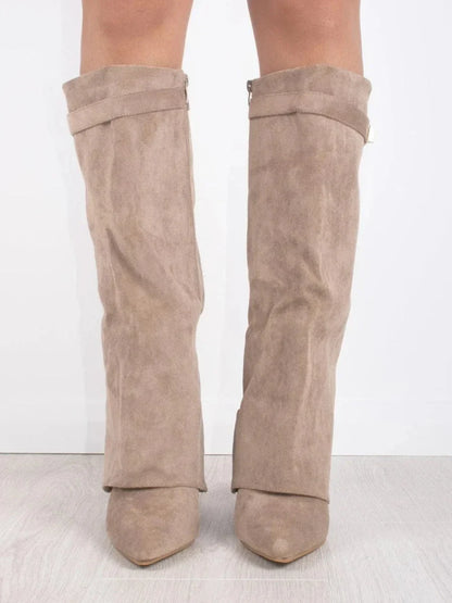 Pair of beige suede heeled knee-high boots with cuff buckle