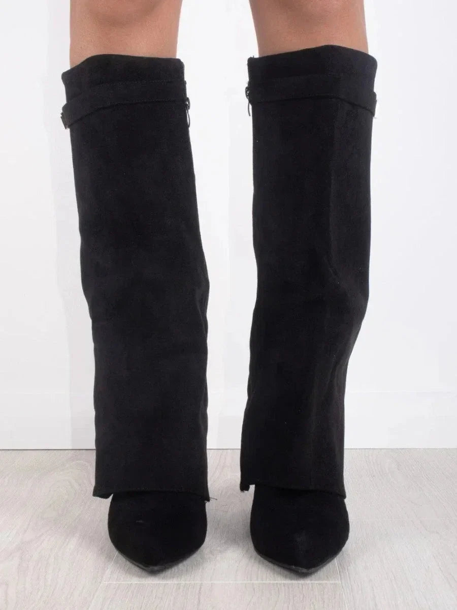 Pair of black suede heeled knee-high boots with cuff buckle accents