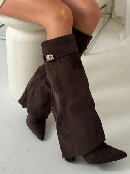 Dark brown suede mid-calf boots with metallic buckle and block heel, angled front