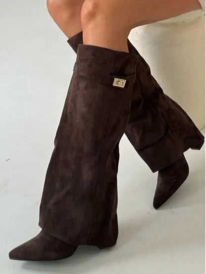 Dark brown suede mid-calf boots with metallic buckle and block heel, side view