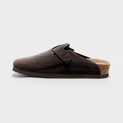 Mocha-brown suede clog side view with adjustable buckle strap and textured sole
