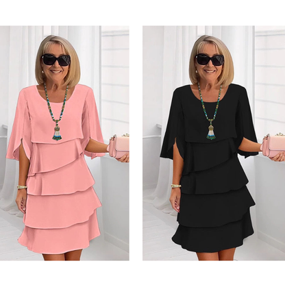 Tiered puff sleeve dresses in pink and black, layered ruffle skirts