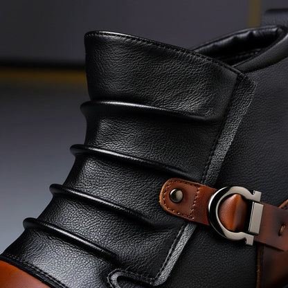 Black genuine leather boots with tan side buckle strap and textured stitching