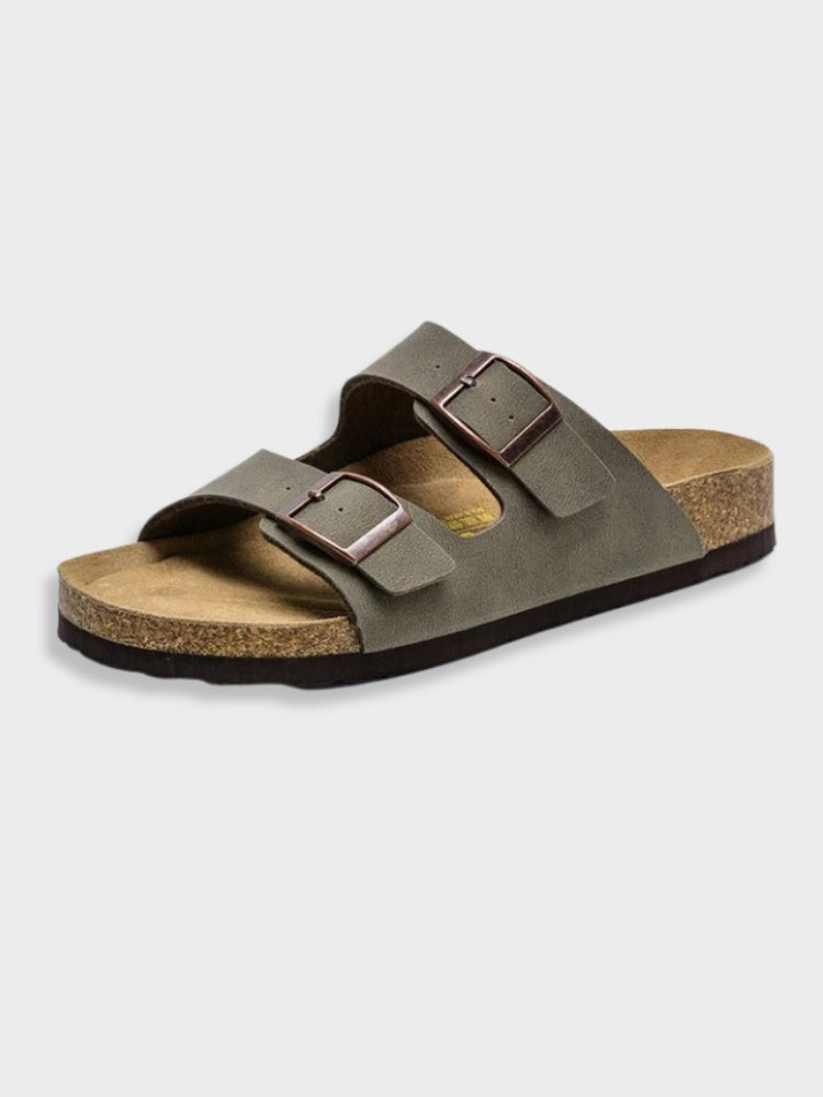 Women's footbed sandals in dark olive with two square buckles and cork-textured sole.